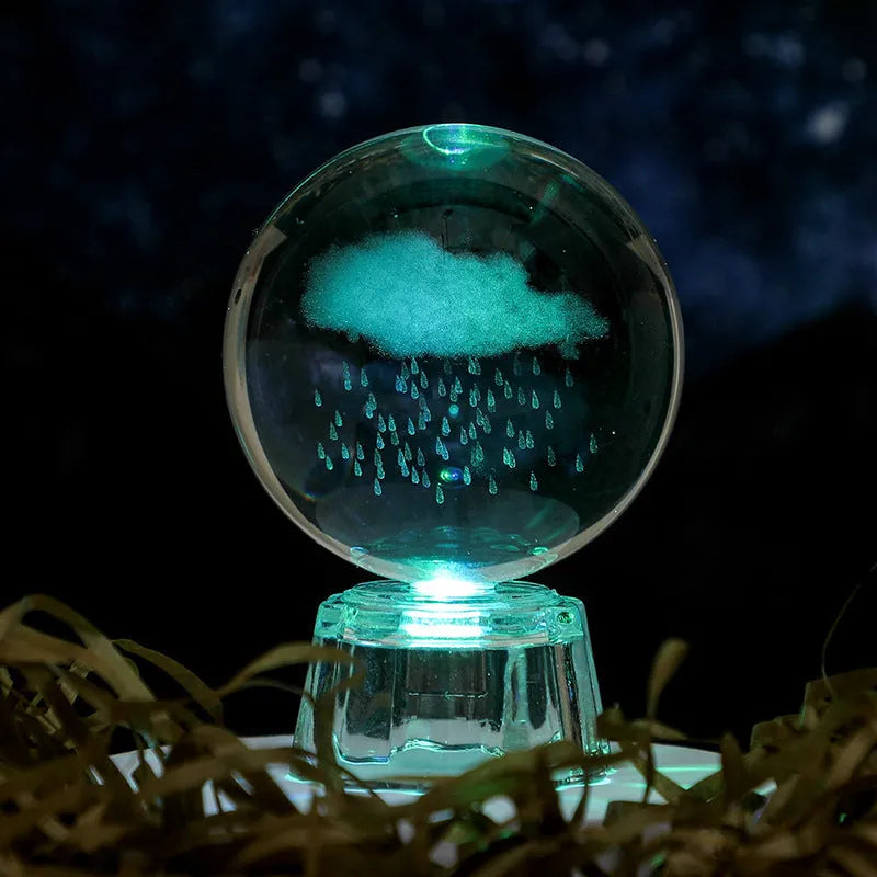 Transparent 6cm crystal ball ornament with inner carving on a fixed base, modern minimalist decor.
