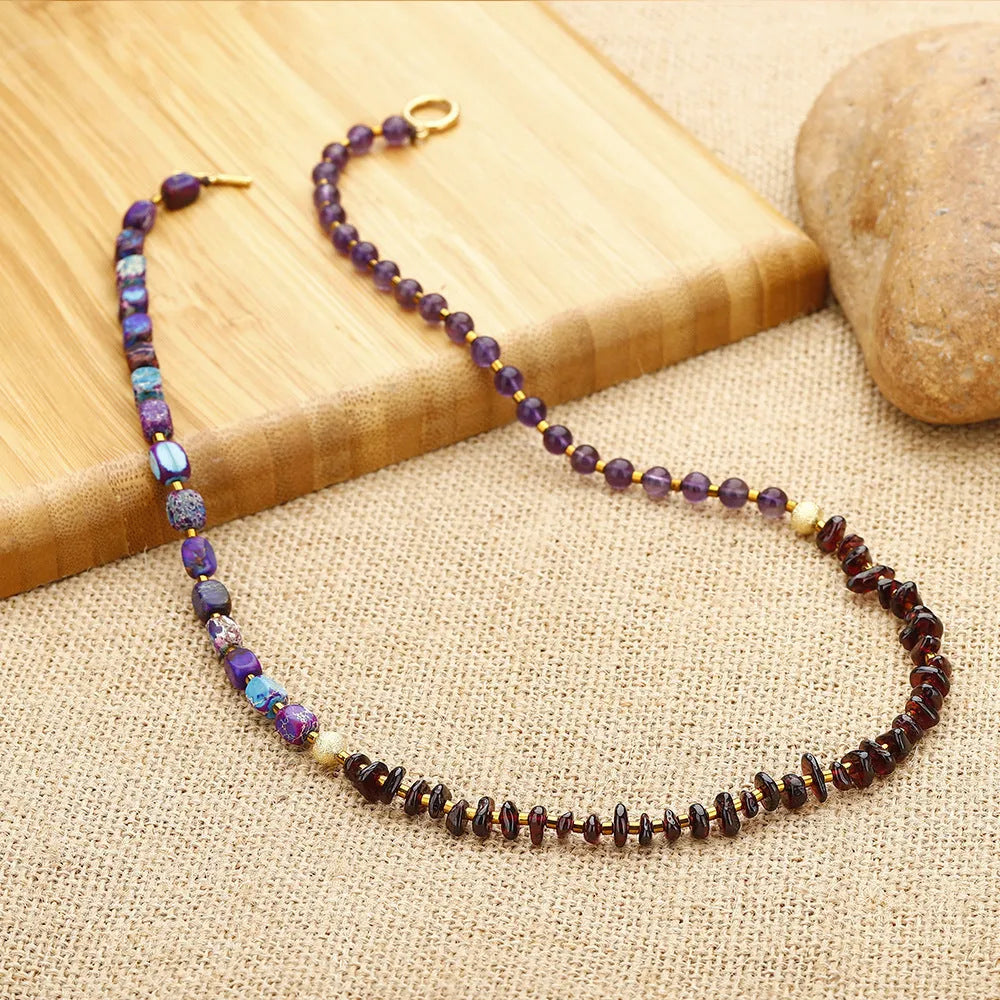 Purple amethyst and garnet stone bead bracelet with geometric design and manual craft details