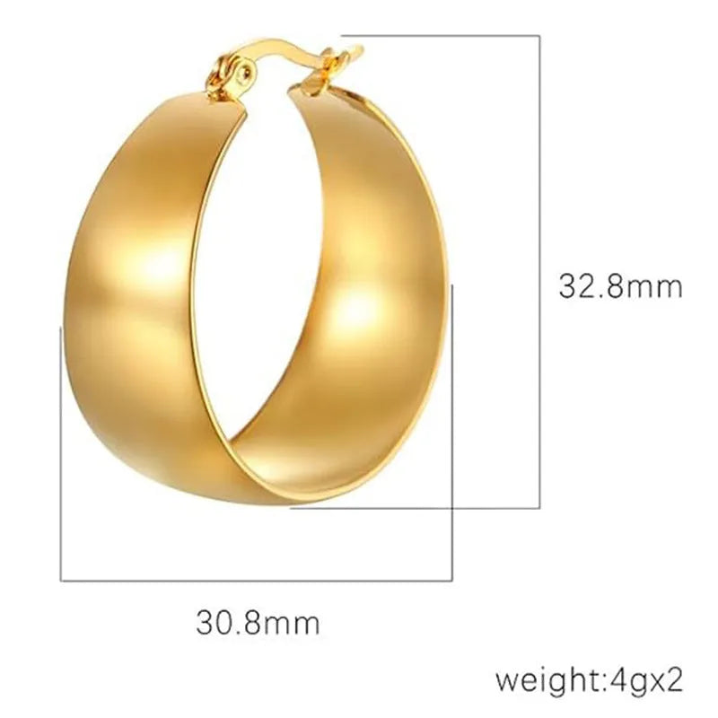 Widened curved stainless steel earrings with titanium content in gold or steel colour