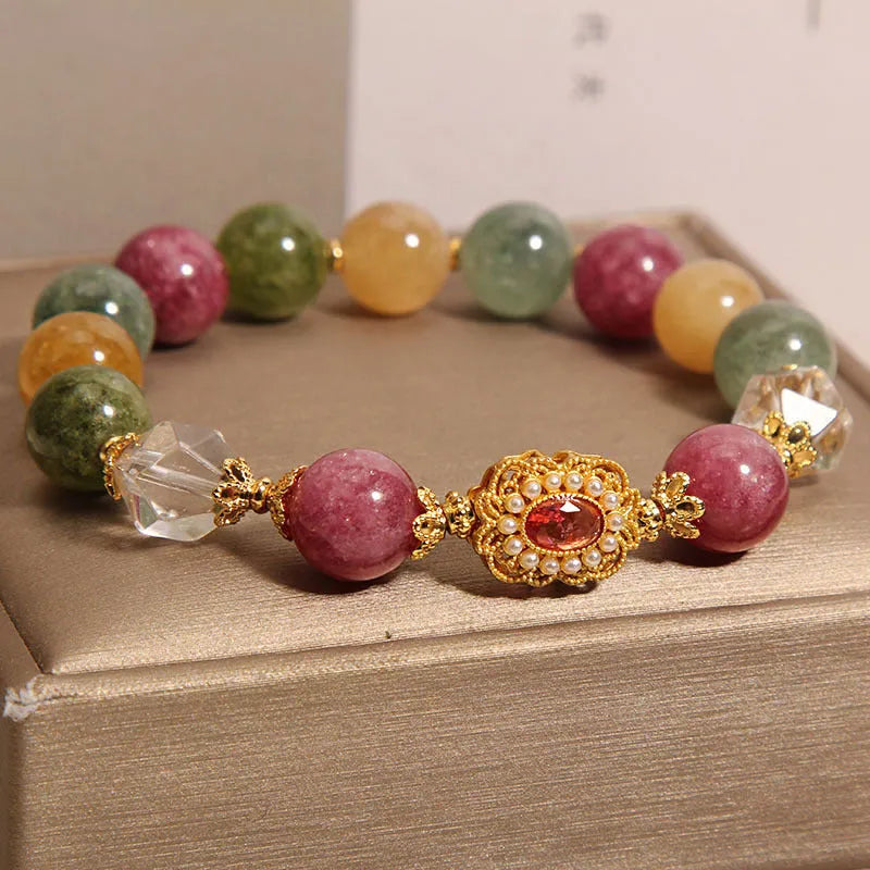 Jade colour tourmaline bracelet for women with round beads on pearl crystal base and rhinestone details