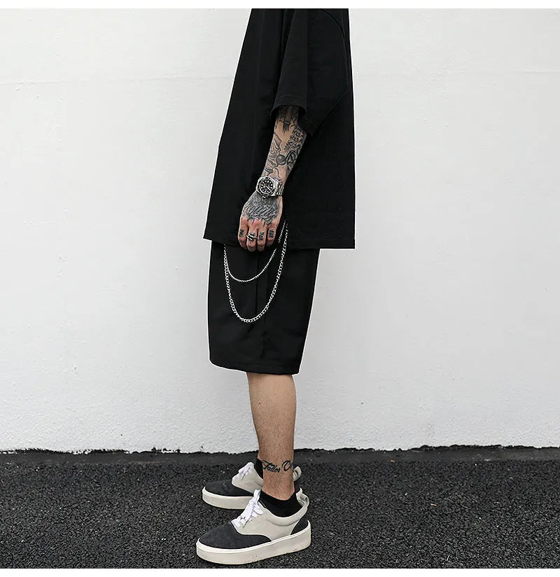 Black cotton trouser chain suit shorts for men with secure key chain, side view