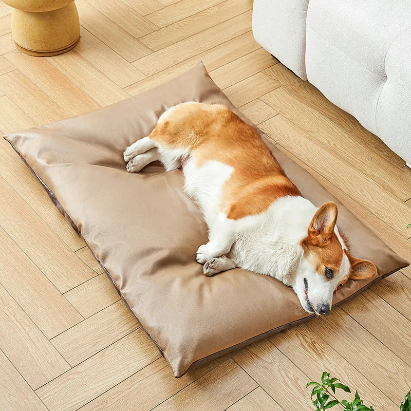 Blue cooling pet bed for cat or small dog showing lightweight foam construction and size scale.
