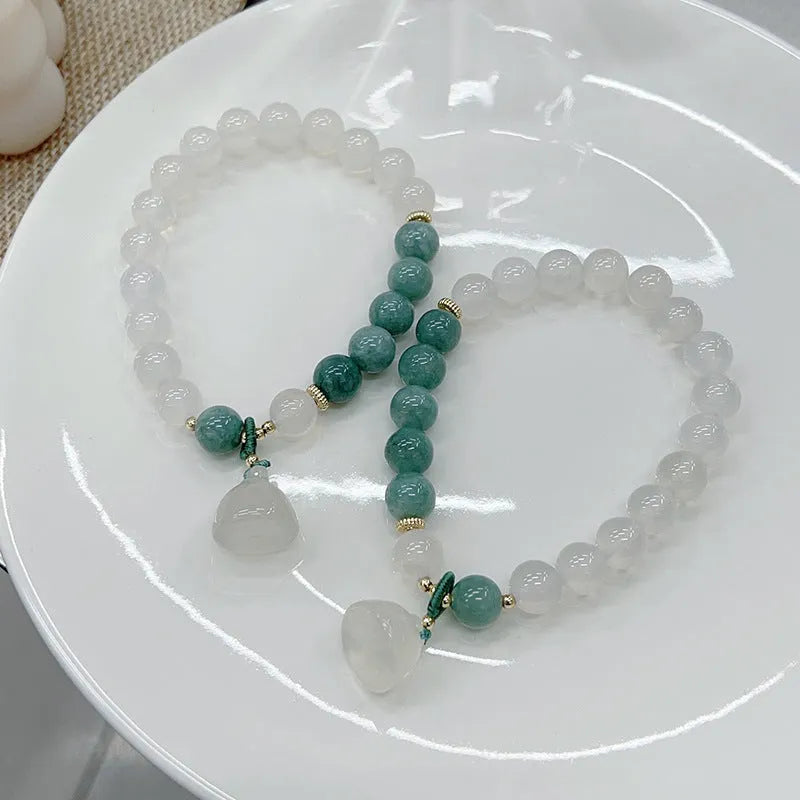 Women's retro Chinese style agate lotus seedpod bracelet with manual craftsmanship and traditional jade accents