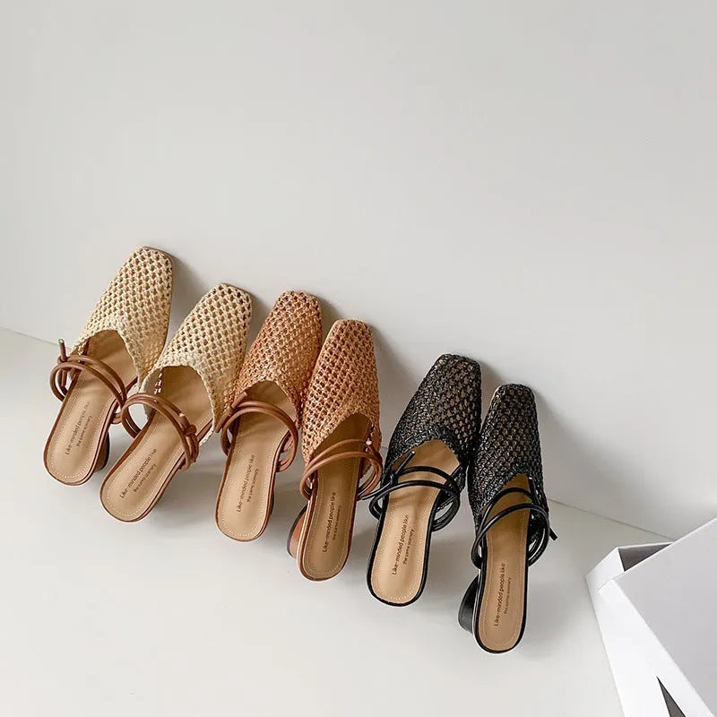 Women's beige square toe slippers with hollow-out design and a chunky mid-heel on a rubber sole.