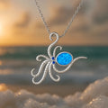 Silver stainless steel necklace with geometric octopus pendant containing an opal inlay.