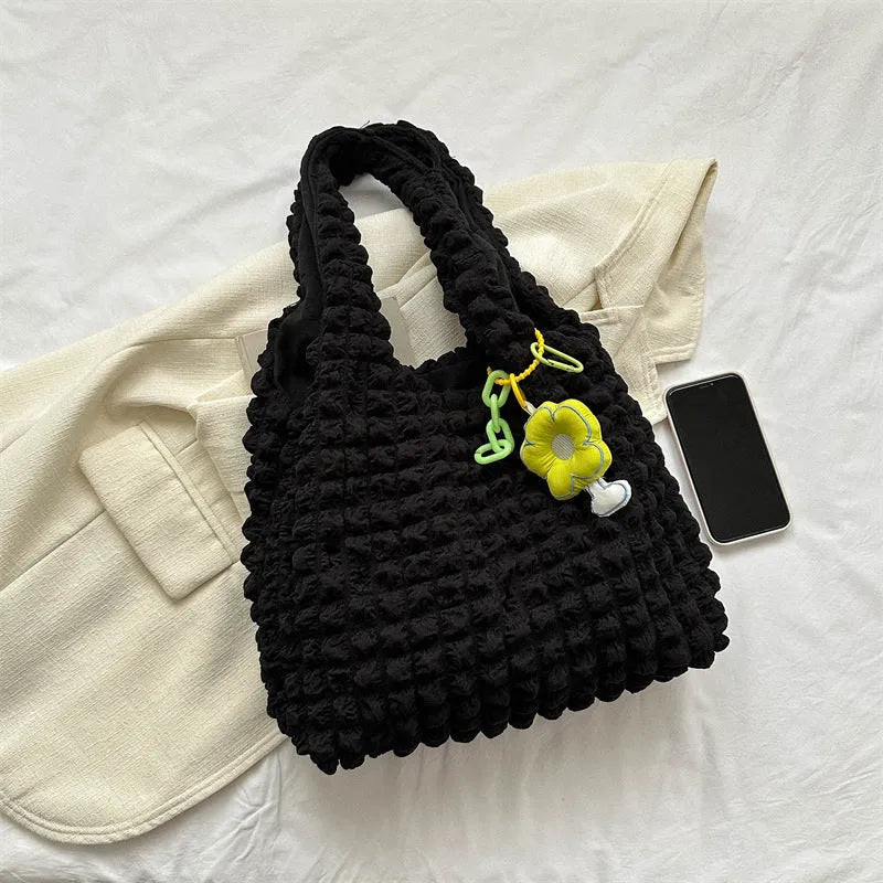 Women's pleated bubble crossbody bag in soft polyester with pendant accessory in vertical square design