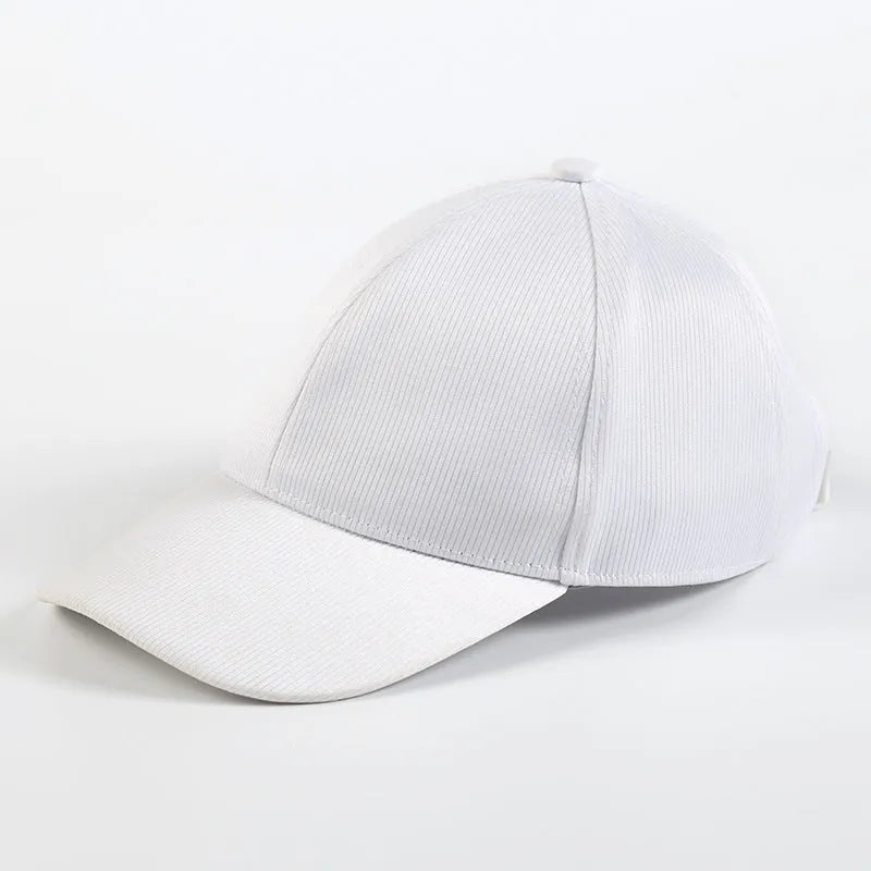 Luminous baseball cap with optical fiber fabric, dome crown, black colour, side view showing light glow