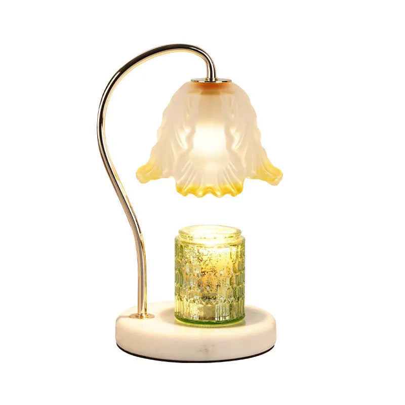 Candle light log aromatherapy table lamp with glass lampshade on nightstand, two bulbs lit, natural wood base