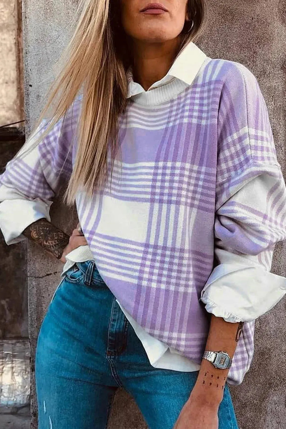 Lilac plaid print loose sweater with ribbed trim on the cuffs and a relaxed fit.