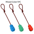 Rubber rope hoist pet toy with ball and rope in mixed colour hair, shown in 9cm small and 12cm large sizes