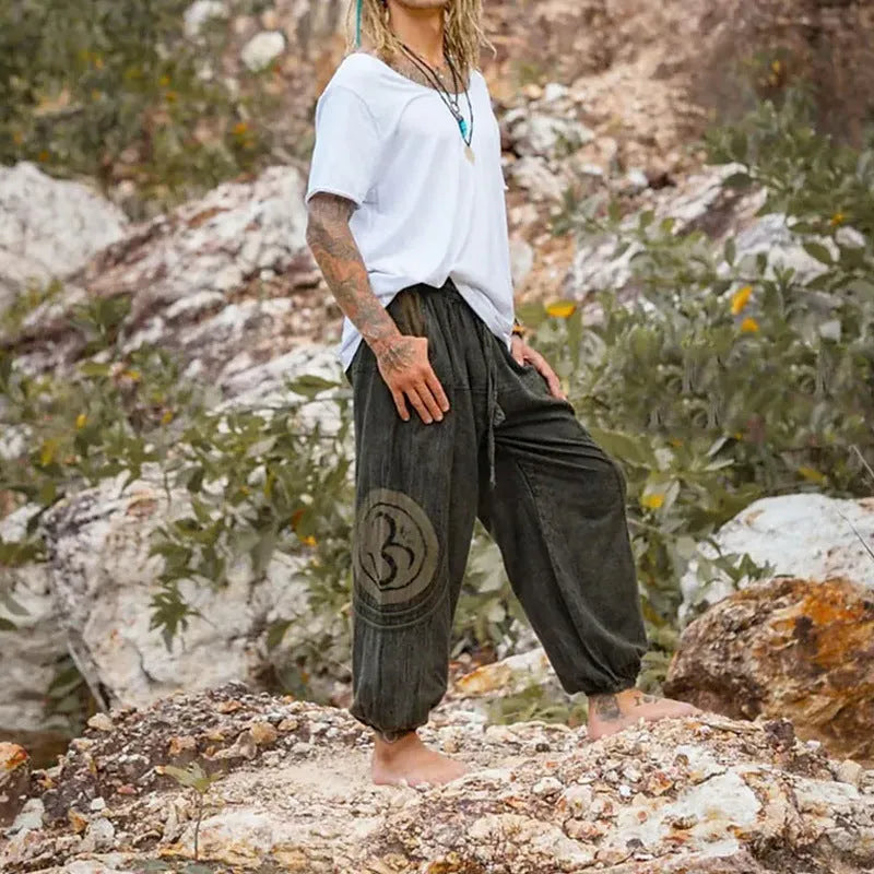 Men's dark green ethnic pattern ankle-tied casual trousers with mid waist and thin polyester construction