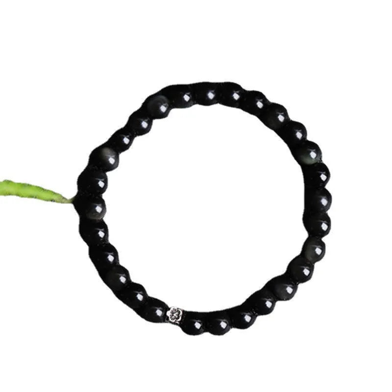Natural obsidian bracelet with S925 silver flower accessories showing 6mm stone beads