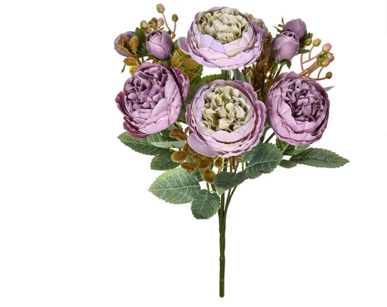 Artificial silk peony bouquet in a vase, showing realistic pink and champagne coloured blooms for home decor.