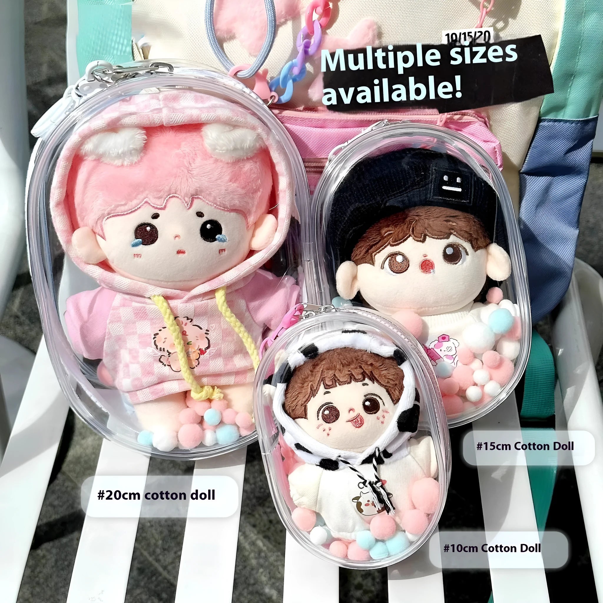 Clear PVC cube storage bag with cartoon keychain for dolls, available in multiple colours and sizes.