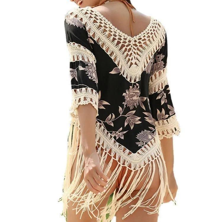 Women's apricot V-neck sun protection blouse with long sleeves and hollow-out design on a mannequin.