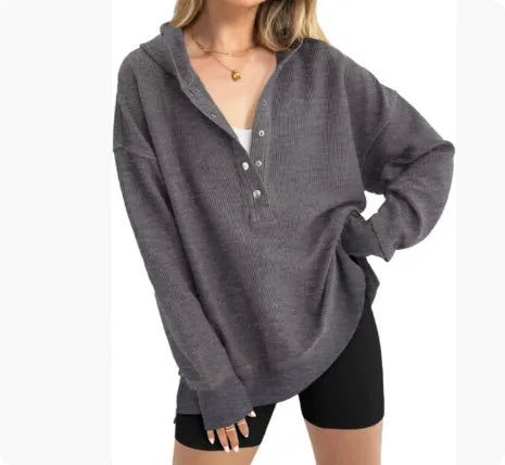 Women's solid colour loose-fit pullover sweater with raglan sleeves in peacock green.