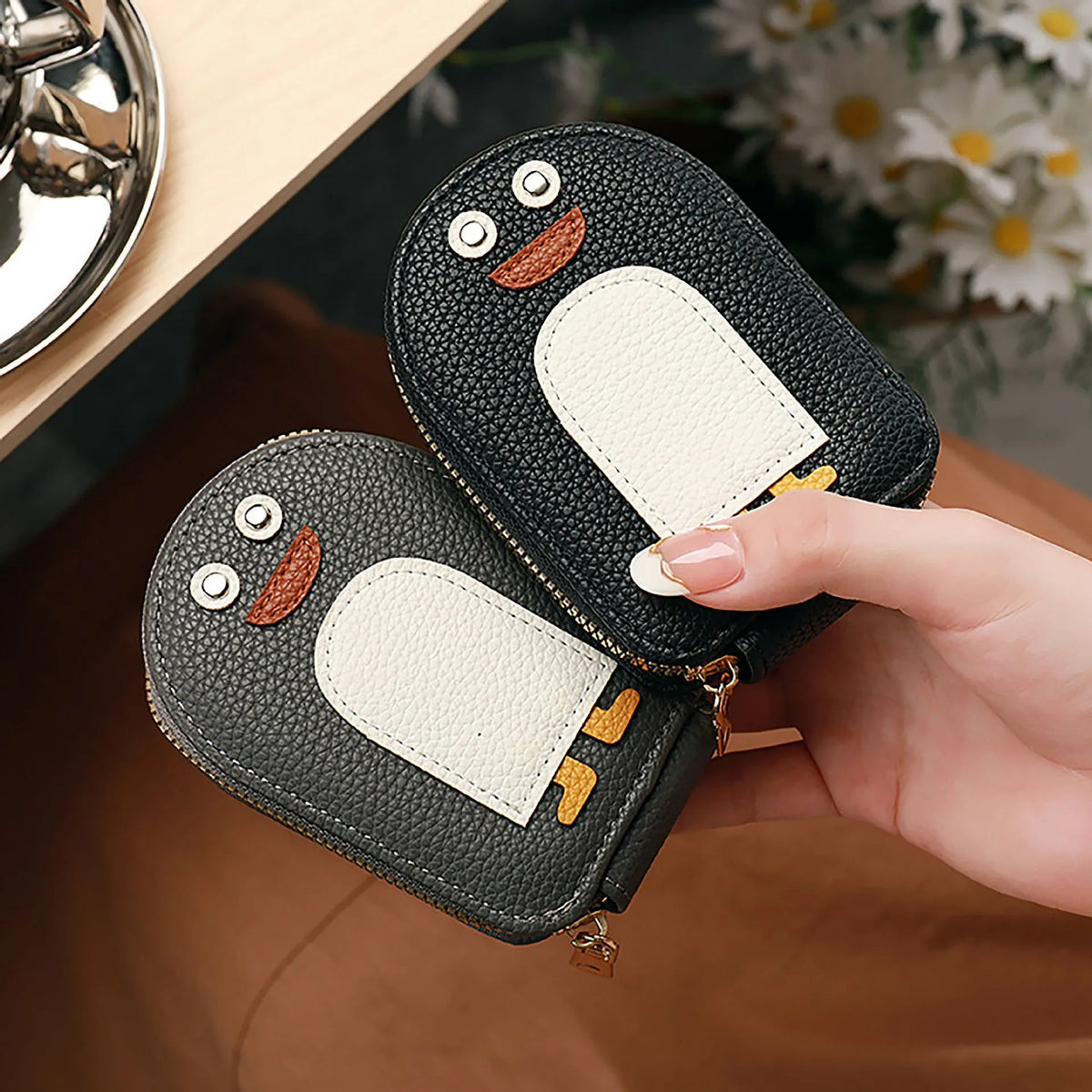 Lychee pattern penguin expanding card holder in black PU leather with rivet details 12x7.5x3cm