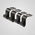 Set of four black PP plastic universal car seat back hooks on a car front seat backrest