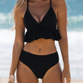 Women's solid colour split bikini swimsuit in black on a model