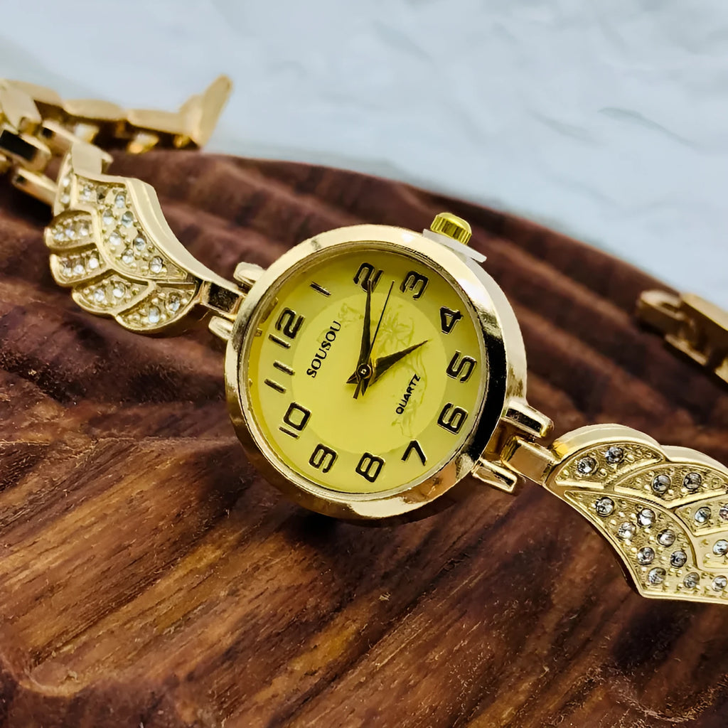 Stainless steel women's watch with round dial showing gold face colour option and vachette clasp buckle