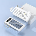 Black and white solar power bank with digital capacity display and a multi-connector charging cable