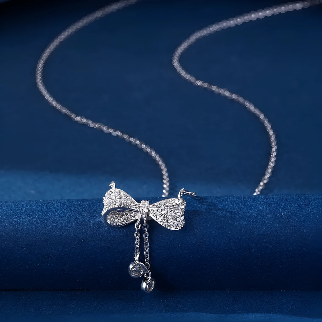 S925 sterling silver necklace with bow pendant on 40-45cm O-ring chain