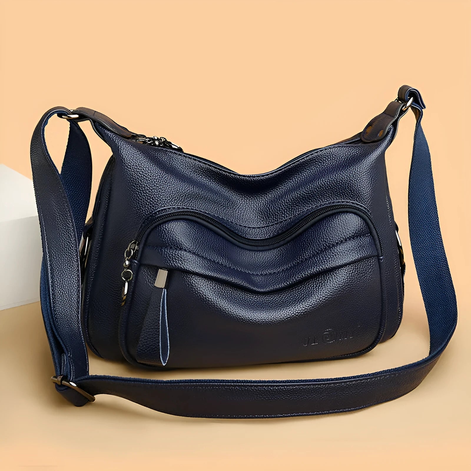Large black women's crossbody shoulder bag with multiple internal compartments and zip closure