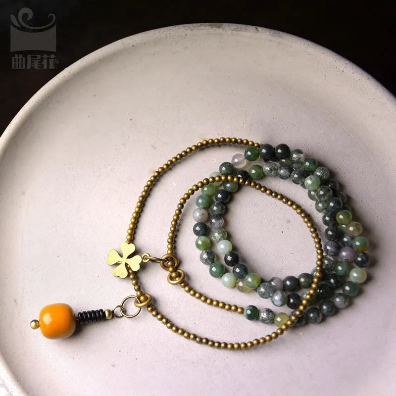Handcrafted multi-layered ethnic style bracelet for children made from natural crystal or semi-precious stone.
