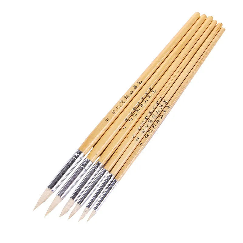 Six wooden-handled artistic wool pointed hook brushes in conventional colours for textile work