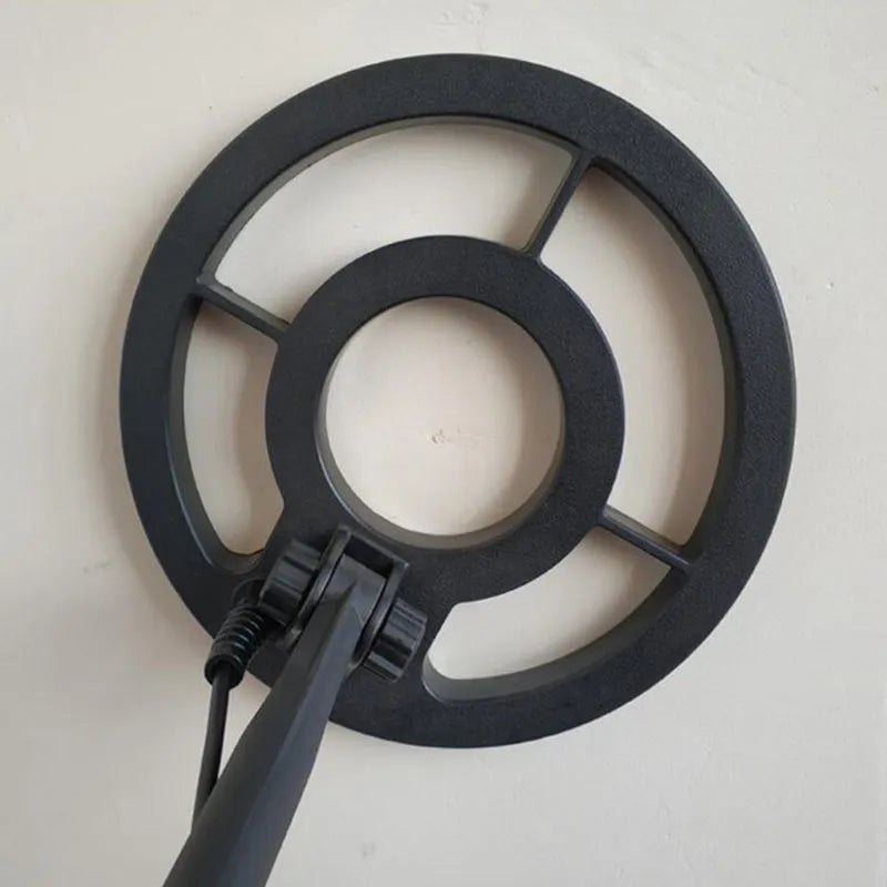 GC1028 black and yellow metal detector with LCD display and adjustable pole, showing waterproof search coil.