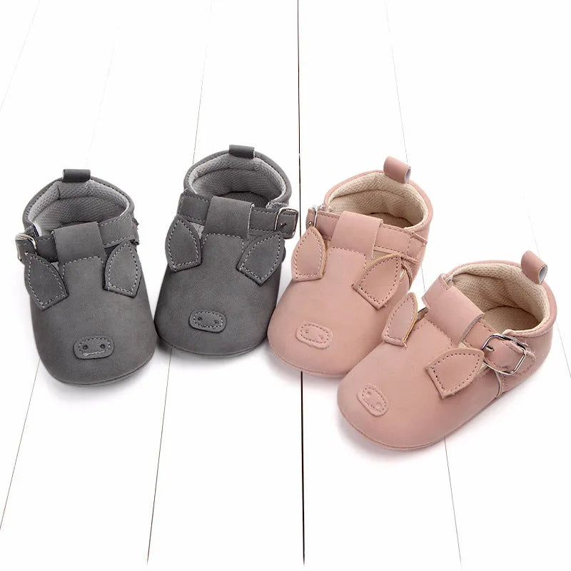 Spring autumn cartoon animal baby shoes in beige panda design with matte nubuck leather upper and soft non-slip sole.