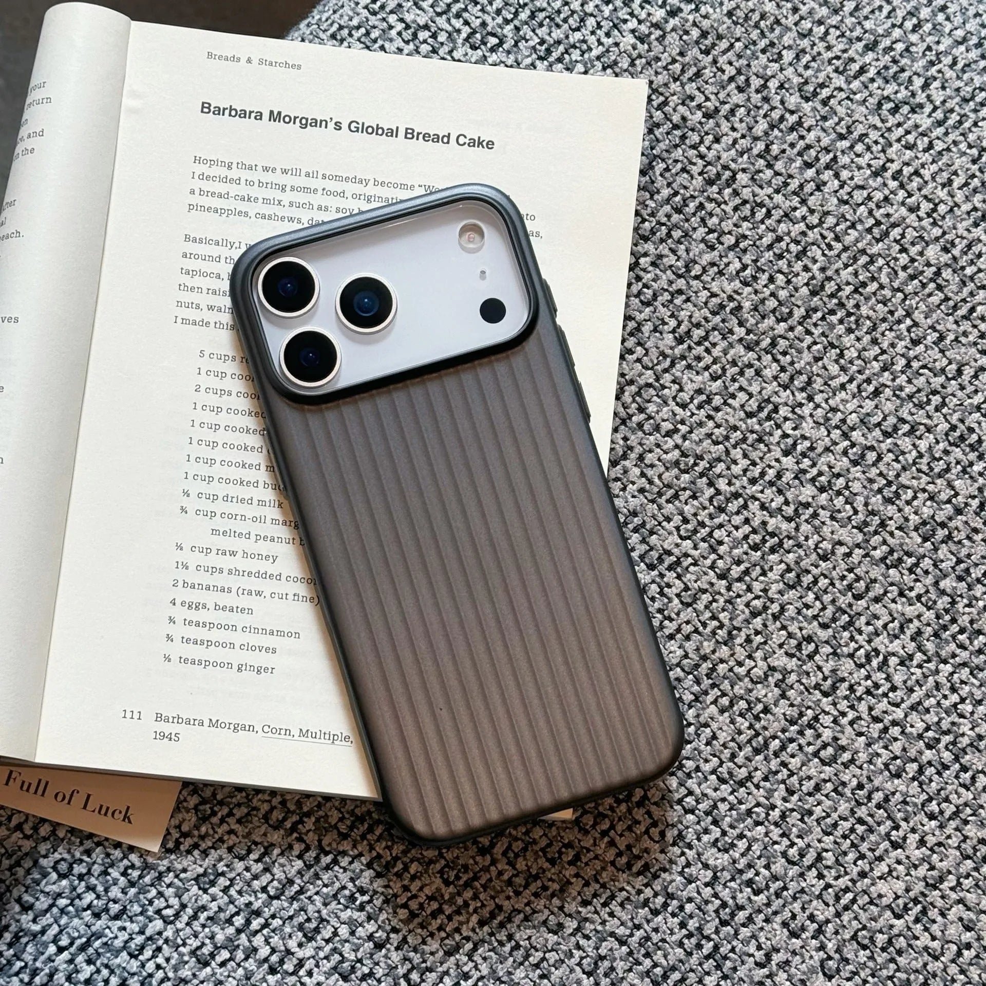 Large hole magnetic drop-resistant protective phone case in black for iPhone with frosted finish