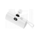 Colourful capsule-shaped power bank with digital display and a folding plug extended.