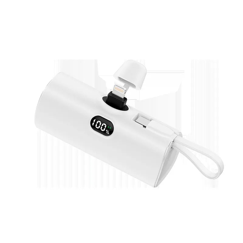 Compact digital display wireless power bank with fold-out UK plug in multiple colours.