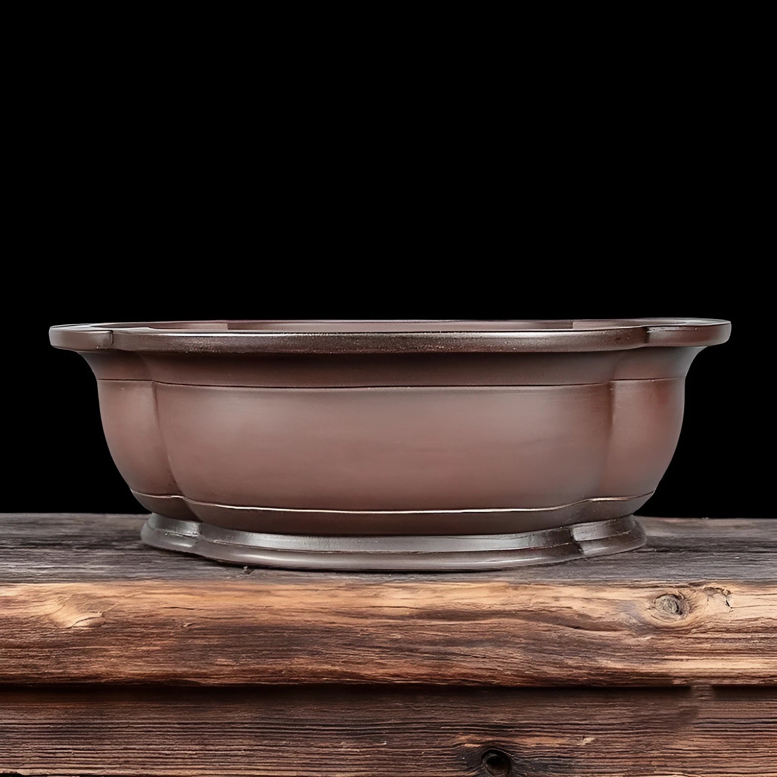 Handmade antique crabapple shaped purple clay flowerpot measuring 74x61x23cm.