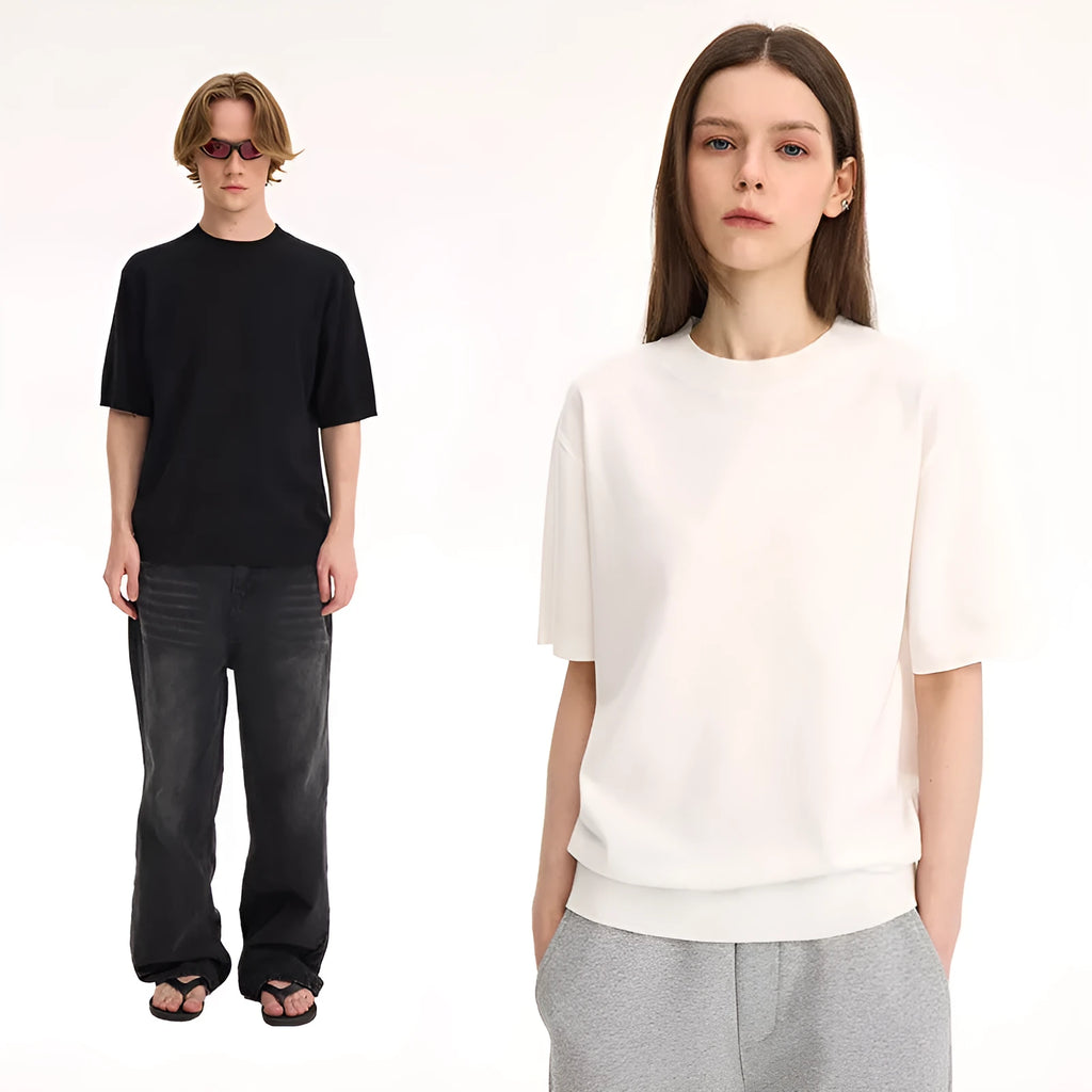 Fanio solid colour short-sleeve T-shirt in black velvet fabric on a hanger.