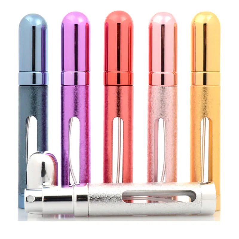 Blue aluminium travel perfume atomiser bullet bottle with glass liner, 12ml capacity.