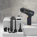 Black wireless car vacuum cleaner with multiple nozzle attachments and inflation function