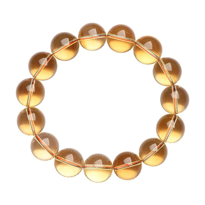 Original design natural citrine scattered beads ball bracelet showing polished yellow stones in a textured arrangement.