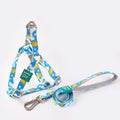 Polyester dog walking vest with haulage rope in blue, green, or pink colours for medium and large breed dogs