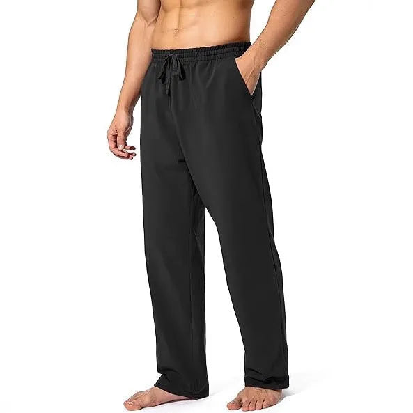 Men's loose casual trousers in black polyester fabric for sports and leisure wear