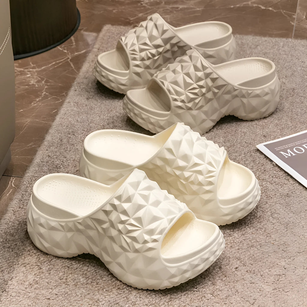 Women's high heel flip flop slippers with a thick EVA sole in khaki, black, and white colour options.