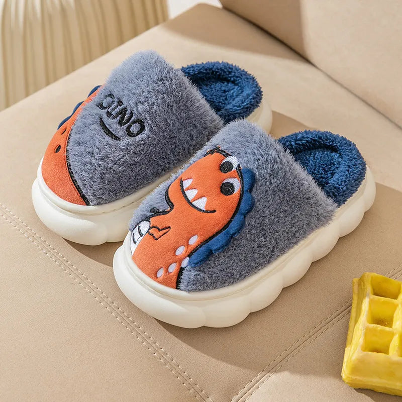A pair of plush cotton couple slippers with a dinosaur pattern in a choice of colours.