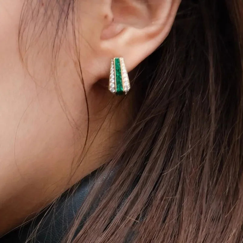 Yellow gold clip-on earrings with round and triangle faux emerald and zircon stones on copper