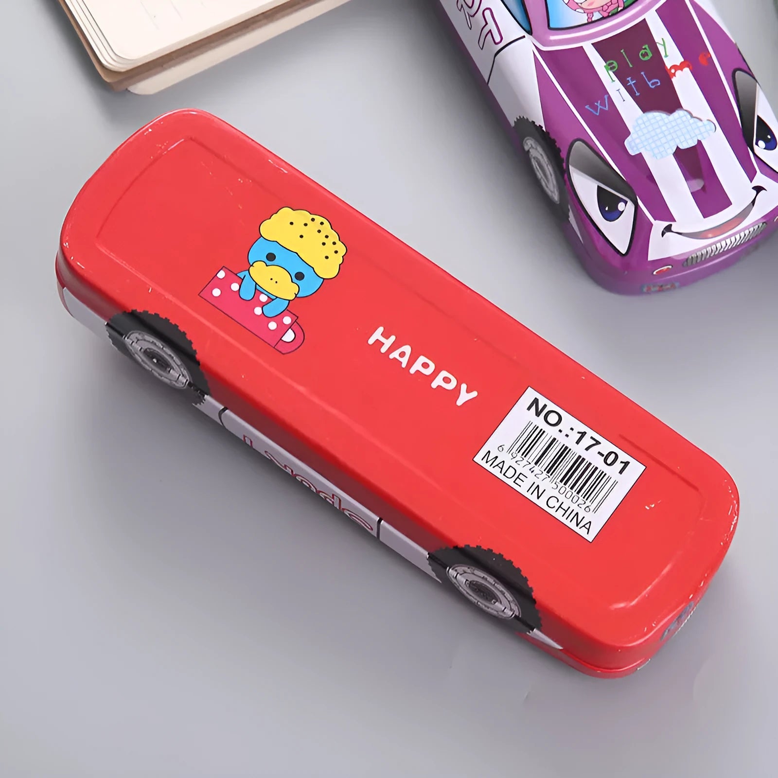 Tinplate double-layer stationery box shaped like a trolley car with a cartoon pattern