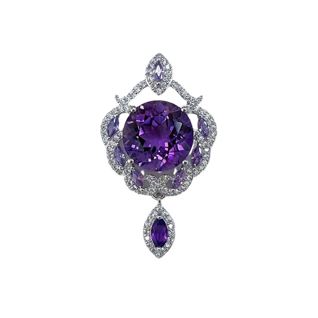 Close-up of a purple amethyst gemstone set in a U-shaped platinum-plated S925 silver pendant with meteor shower detailing.