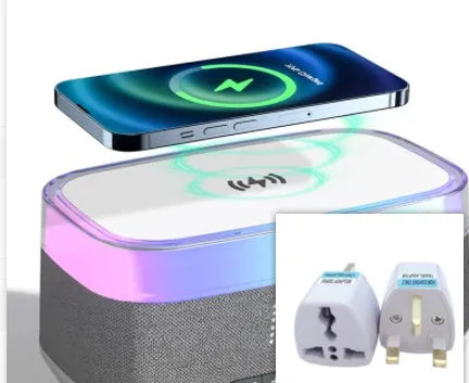 White multifunctional alarm clock with Bluetooth speaker, wireless charging pad, and night light.