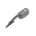 Black 800mA motorcycle helmet wiper motor unit with attached 65mm silicone blade on a helmet.