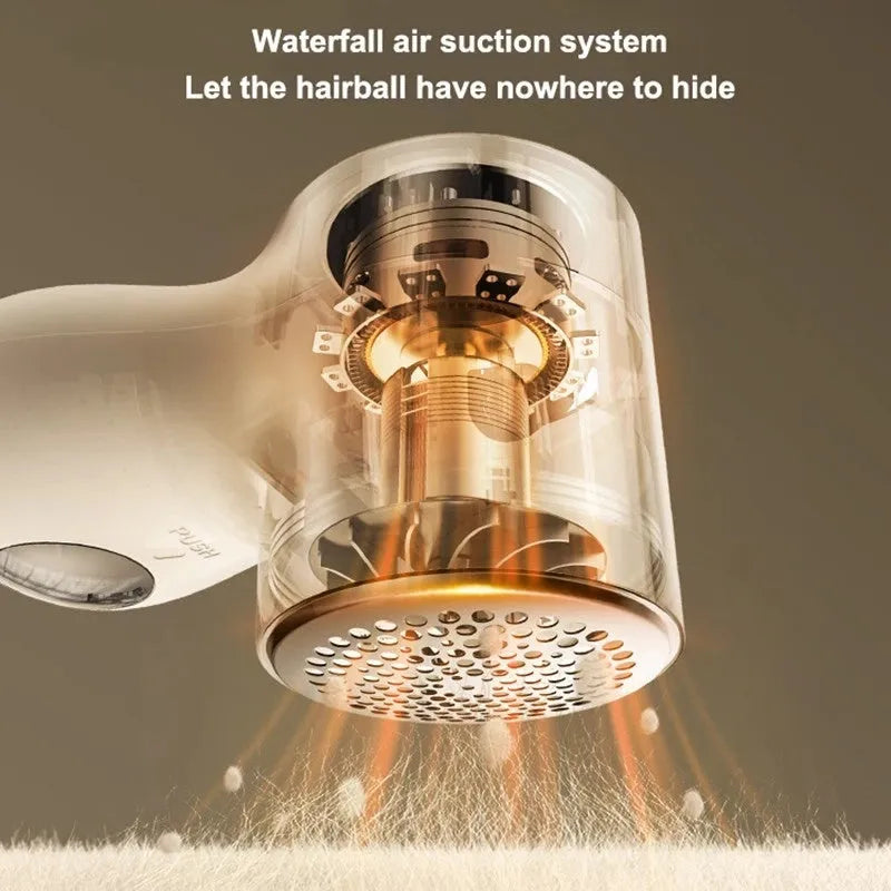 White electric lint remover with LED display showing battery level, placed beside clothing with fabric pilling