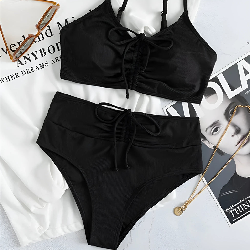 Black women's high waist sling split bikini swimsuit with sleeveless top and shorts